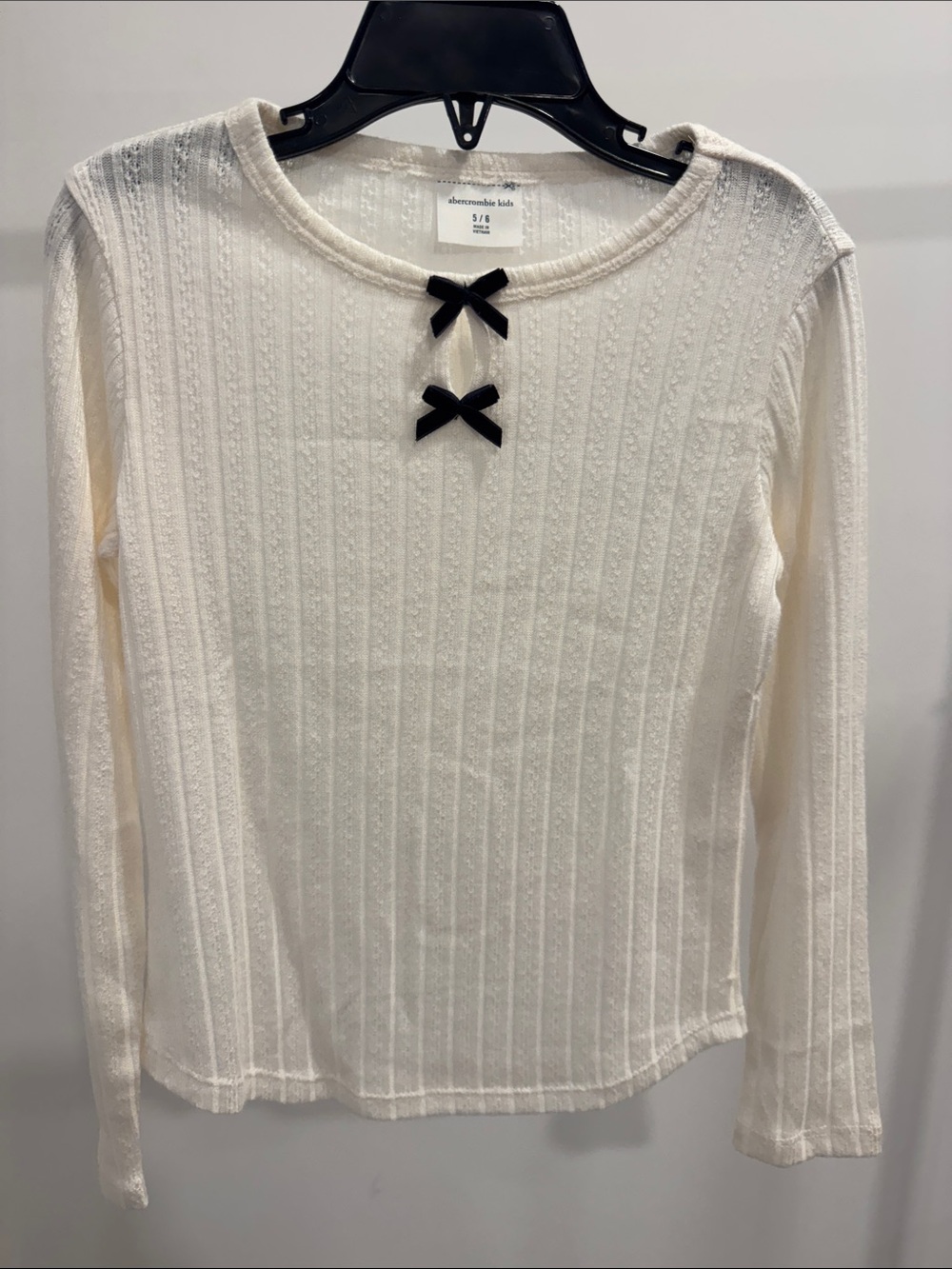abercrombie kids Cream Long-Sleeve Ribbed Top with Black Bows